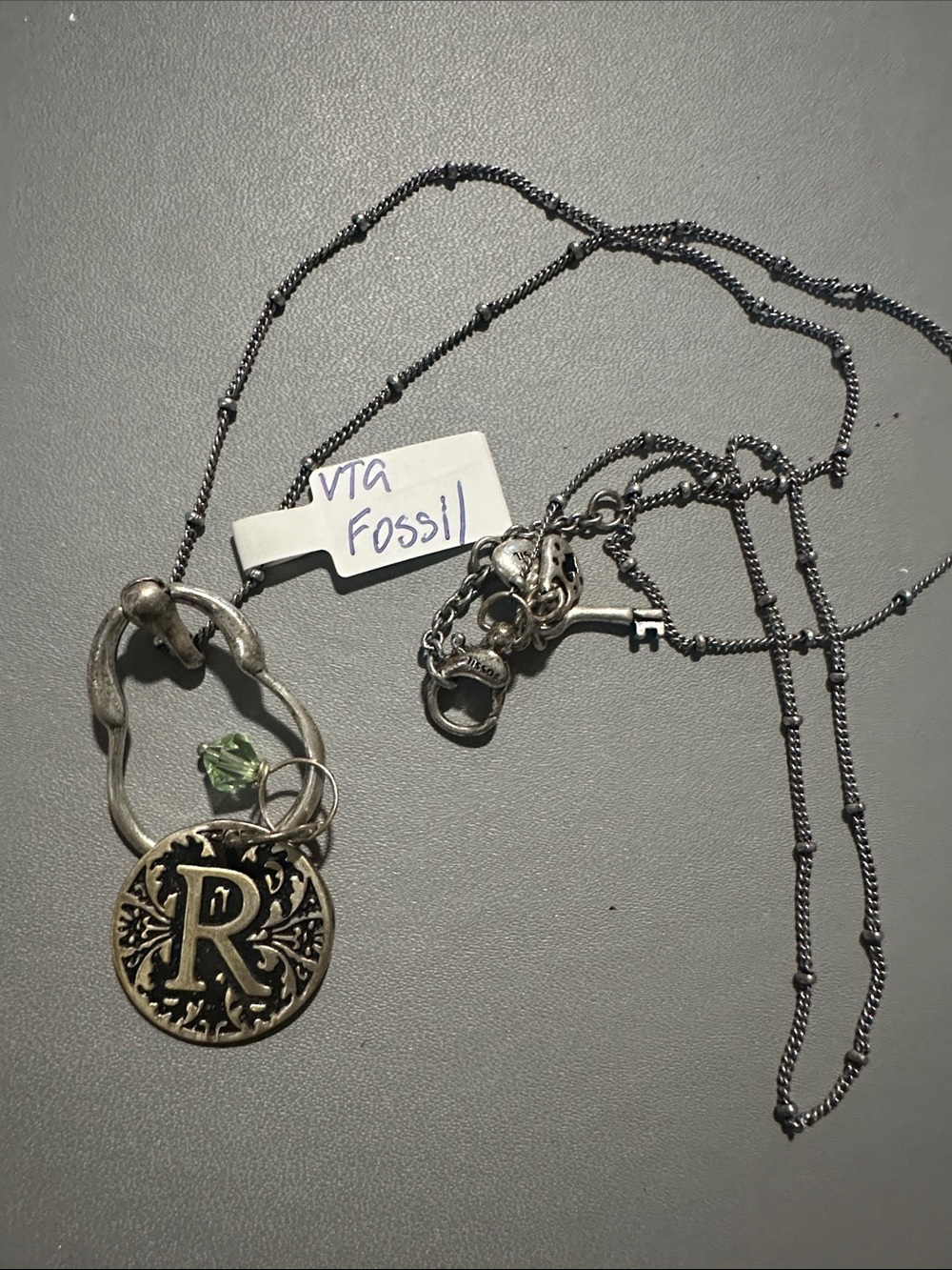 Fossil Silver-Tone 'R' Monogram Necklace with Green Accent